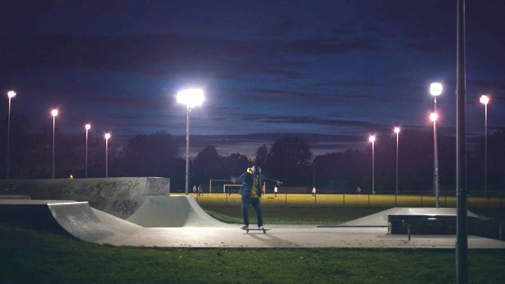 a man skateboarding at a skatepark