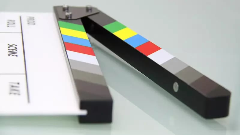 Clapperboard used as part of the role of media production agencies