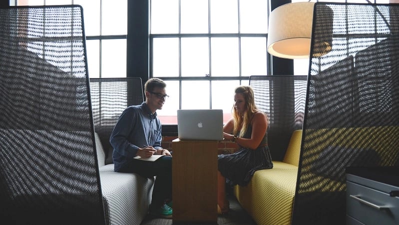 An apple computer and the meeting 