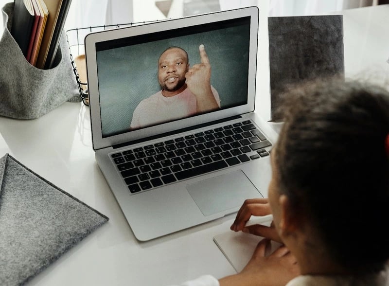In front of a computer