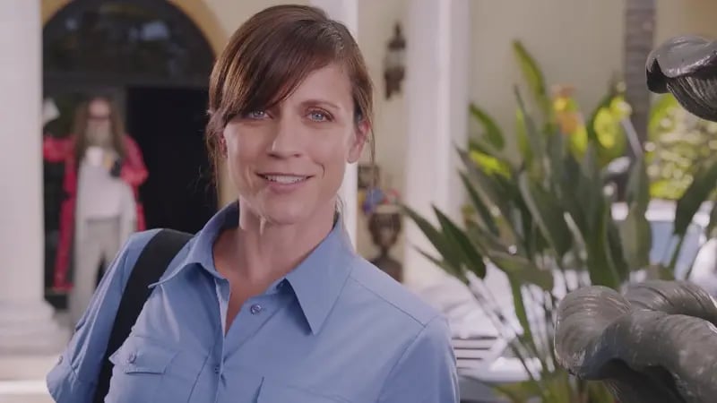 The woman in blue shirt