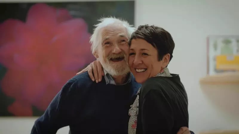 Man smiling after learning the power of storytelling in corporate video production