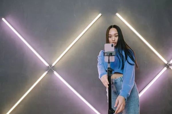 Woman recording ad for tiktok ad examples